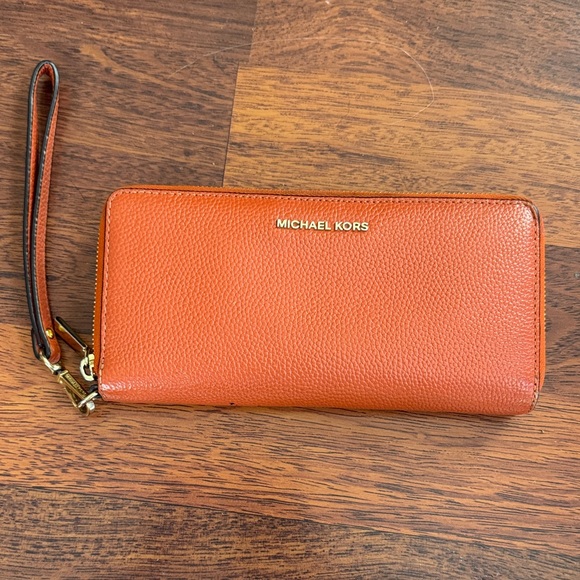Michael Kors Handbags - Michael Kors Burnt Orange Wristlet